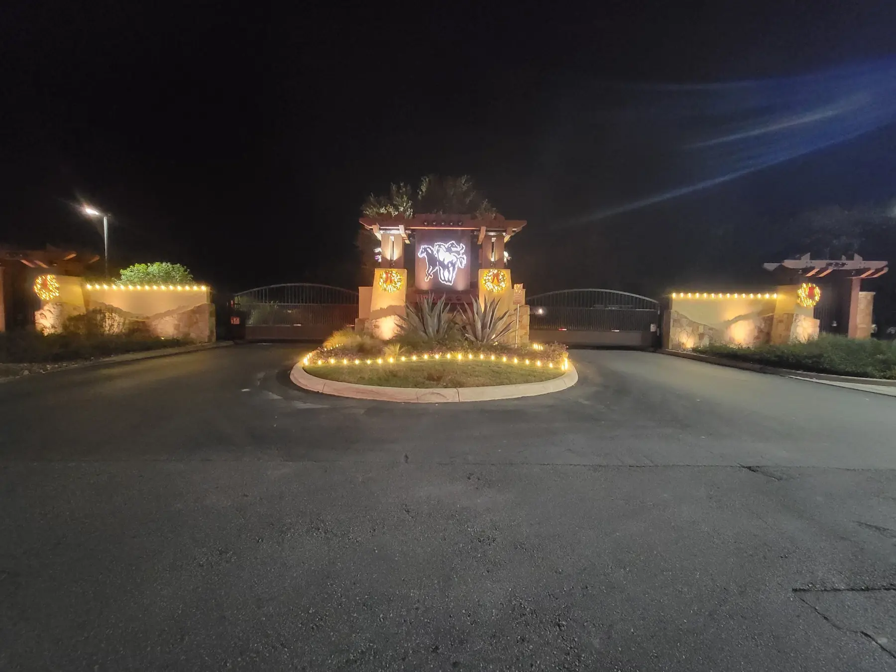 Commercial property entrance decorated with holiday lights